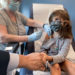 Bridgette Melo, 5, holds onto the hand of her dad Jim Melo as she gets the first of two Pfizer COVID vaccinations on September 28, 2021 during a clinical trial for children at Duke Health.
Shawn Rocco/Duke Health
Photos provided by Duke Health. Permission for CNN to use across all platforms and distribute to affils.