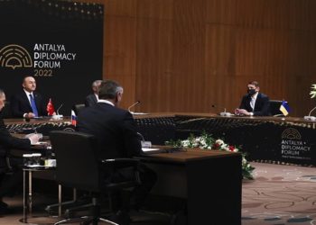 In this photo provided by Turkish Foreign Ministry, Turkish Foreign Minister Mevlut Cavusoglu, top left, chairs a tripartite meeting with Russia's Foreign Minister Sergey Lavrov, left, and Ukraine's Foreign Minister Dmytro Kuleba, right, in Antalya, Turkey, Thursday, March 10, 2022. (Cem Ozdel/Turkish Foreign Ministry via AP)