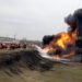 A still image taken from video footage shows members of the Russian Emergencies Ministry extinguishing a fire at a fuel depot in the city of Belgorod, Russia April 1, 2022. Russian Emergencies Ministry/Handout via REUTERS ATTENTION EDITORS - THIS IMAGE HAS BEEN SUPPLIED BY A THIRD PARTY. NO RESALES. NO ARCHIVES. MANDATORY CREDIT.