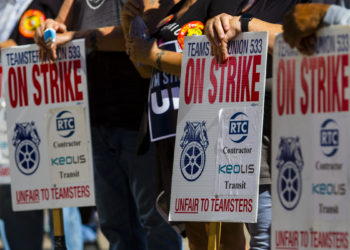 RENO, NEVADA, UNITED STATES - 2021/10/16: Union members on strike holding placards expressing their opinion at a march.
Union members and community members march in protest against Keolis management (multinational transportation company that operates public transport systems) after bus riders faced with disruptive new schedule. Local teamsters 533 remains on strike after negotiations failed. (Photo by Ty O'Neil/SOPA Images/LightRocket via Getty Images)