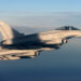 FILE PHOTO: British Royal Air Force's Typhoon Eurofighter jets demonstrate the interception of a Belgian air force transport plane as they fly over Britain, January 14, 2020. Picture taken January 14, 2020. REUTERS/Johanna Geron/File Photo