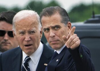 President Joe Biden talks with his son Hunter Biden as he arrives Delaware Air National Guard Base in New Castle, Del., Tuesday, June 11, 2024. (AP Photo/Manuel Balce Ceneta)