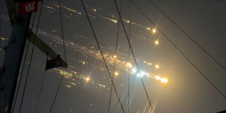 A view shows debris streaking through the sky, after SpaceX's Starship spacecraft tumbled and exploded in space, in Hog Cay, Bahamas, March 6, 2025, in this screen grab obtained from social media video. X @GeneDoctorB/via REUTERS  THIS IMAGE HAS BEEN SUPPLIED BY A THIRD PARTY. MANDATORY CREDIT. NO RESALES. NO ARCHIVES.