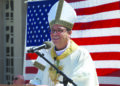 Bishop Rojas speaks during the Memorial Day Field Mass at St. Mary Cemetery in Evergreen Park on Memorial Day.  (Julie Jaidinger / Chicago Catholic)