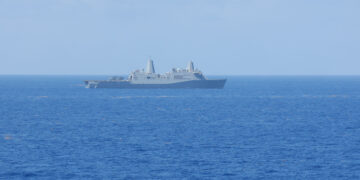 CARIBBEAN SEA (Aug. 28, 2025) The amphibious transport dock USS San Antonio (LPD 17) maneuvers to formation with the rest of the Iwo Jima Amphibious Ready Group (IWO ARG) during its regularly scheduled deployment to the U.S. Fourth Fleet area of responsibility. U.S. Naval Forces Southern Command/U.S. Fourth Fleet is the trusted maritime partner for Caribbean, Central and South America maritime forces leading to improved unity, security, and stability. (U.S. Navy Photo by Mass Communication Specialist Seaman Brendan Watt)